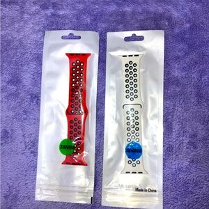 Two Apple Watch bands red and white